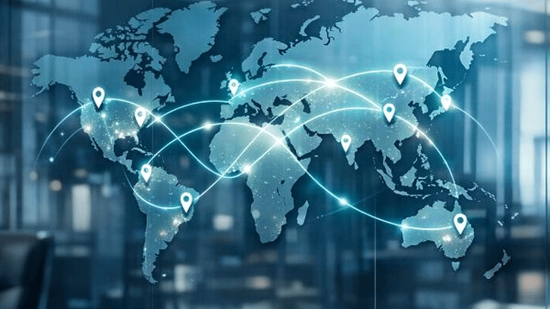 Stylized world map on glass with teal route arcs and location pins in a modern office.
